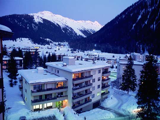  High angle view of buildings covered with snow