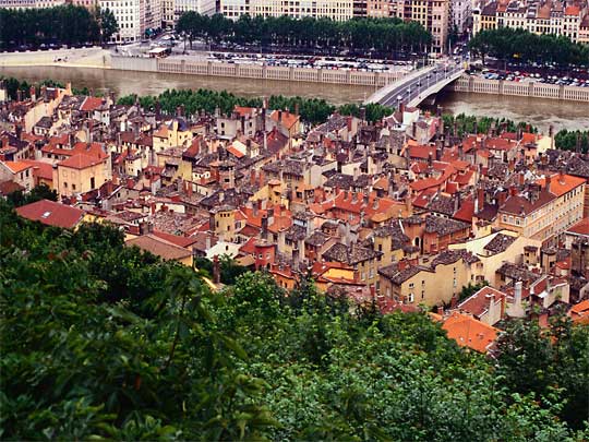  Overhead view of buildings, bridge and river