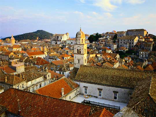  Orange tiled roofs, many restored after damage from shelling in 1991 civil war