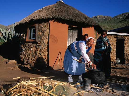  Basotho woman and children in village of Malealea, south western Lesotho
