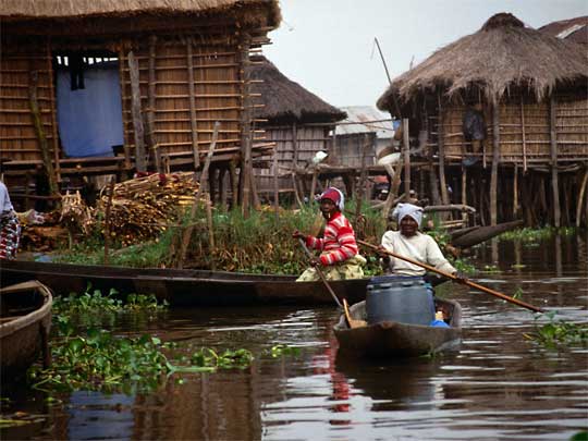  Women of Ganvié village, where 27,000 people live in 3,000 fragile stilt houses