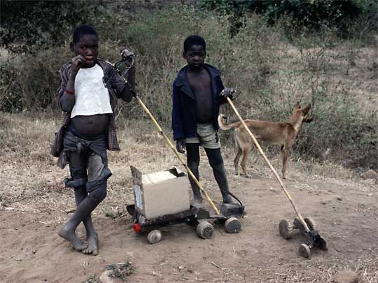  Matabele boys with homemade toys and pet dog, near Bulawayo, southern Zimbabwe