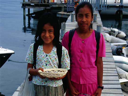  Entrepreneurs of the future: local kids selling trinkets on dock