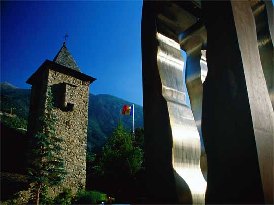  Modern steel sculpture in garden square outside the Casa de la Vall (House of the Valley), the national parliament house.