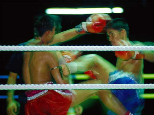 Thai boxing, with fists and feet, at Sanam Muay Lumphini Boxing Stadium