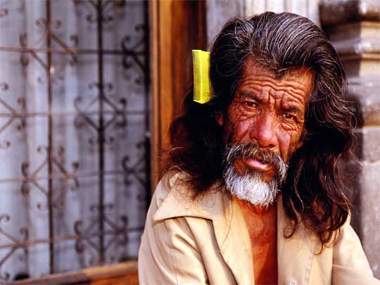  Every face and every line tells a story: Guatemalan man in deep contemplation