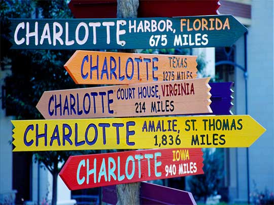  Which way to Charlotte? Signs on The Green, downtown.