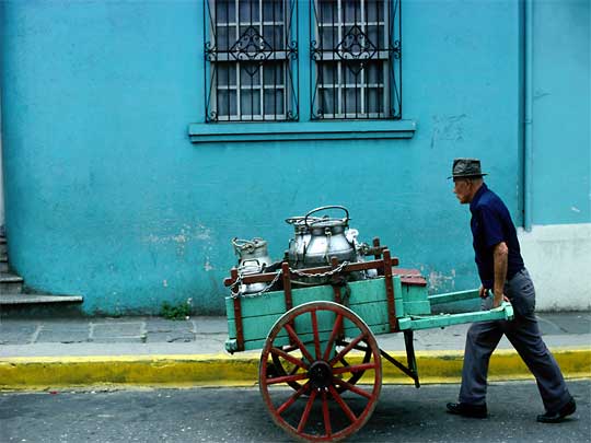  Milkman, pushing his pastel cart through pastel streets