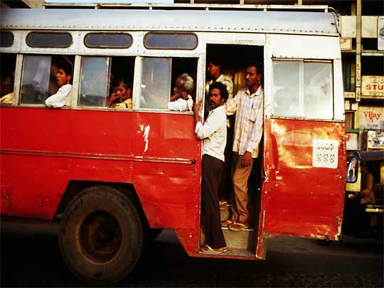 People find room on a crowded city bus