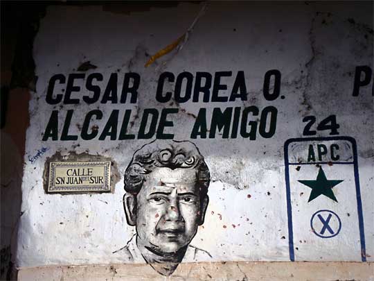  Political mural riddled with bullet holes, downtown Managua