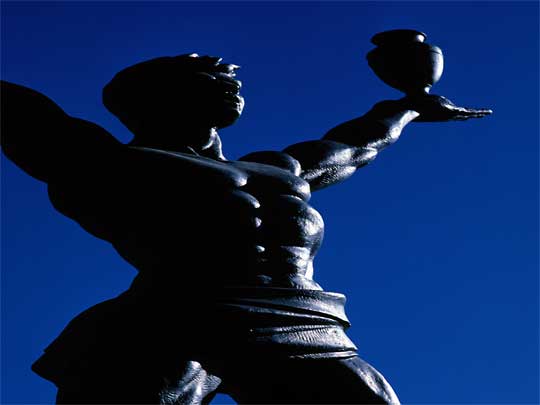  Cochabamba or bust: a statue silhouetted against a blue Bolivian sky
