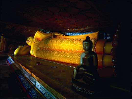  Big, yellow, recumbent Buddha, in cave at Mulkirigala Temple, near Tangalla