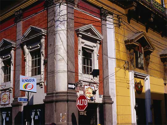  Buildings with dodgy wiring on a street corner in Quetzaltenango