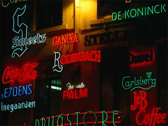  Neon beer signs on café façade