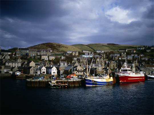  Boats in the harbour provide the only splash of colour on a Scottish kind of day