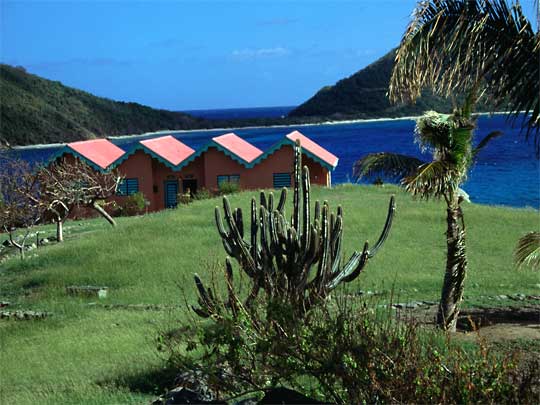  Bright pink beach houses splashed across the deep blue of Marina Cay, British Virgin Islands