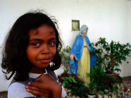  Girl in church partly destroyed by Indonesian militia, Dilli