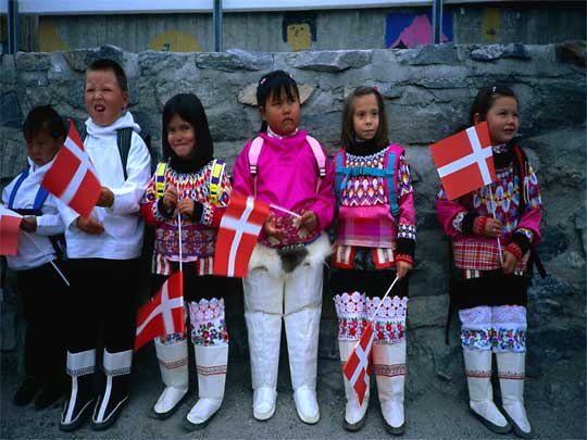  Flying the flag of national pride: lining up for the first day of school in colourful traditional costume