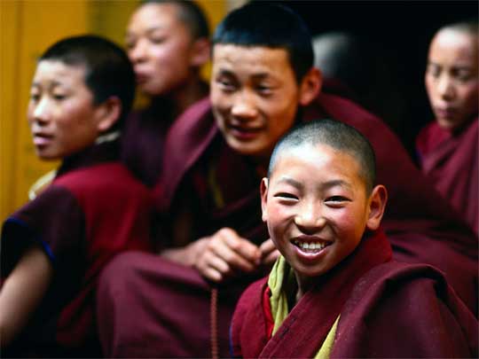  Buddhist monks, one quite cheerful, at Sera Monastery, near Lhasa