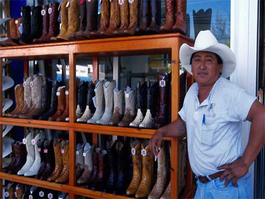  Mexican cowboy puts his boots up and relaxes