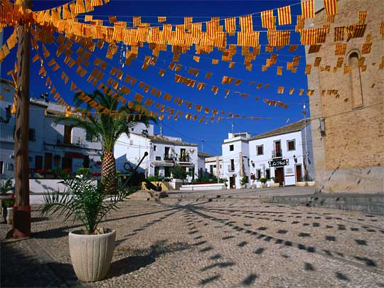  Festive bunting in regional colours decorates the old town square