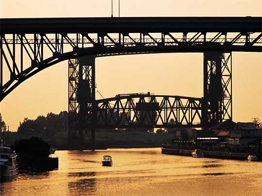 Cuyahoga River fortified by bridges, at dusk