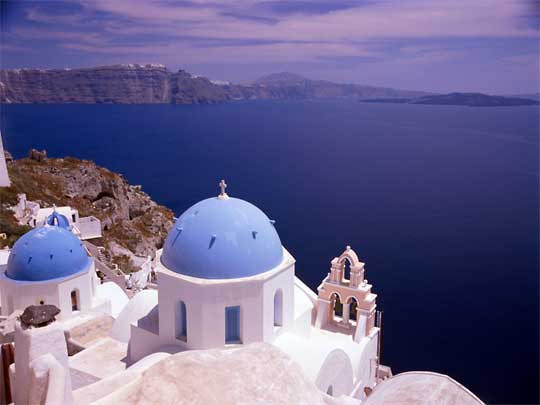  Orthodox church perched on volcanic rim of Santorini
