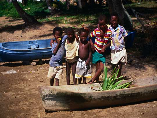  Group of local kids pose for the camera, Roatán