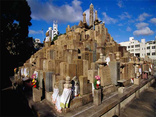  Gravestones gathered on a mound in the grounds of the Shitenno-ji temple in Tennoji, Osaka