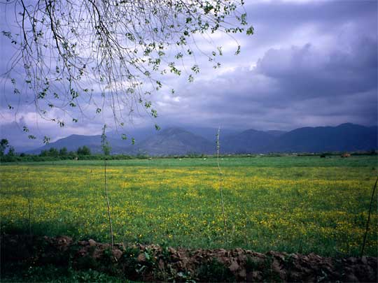  Solemn mountains watch over the lush countryside north of Tirana