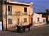 Lone man riding buggy in St Louis, northern Senegal