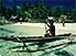 Tribesman in outrigger canoe, near small village of Egam, Milne Bay Province