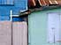 Caribbean pastels, looking a bit shabby, in Charlestown, Neivs