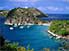 Blue waters and sailing ships around Pain du Sucre on Terre-de-Haut