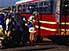 Women selling fruit and vegetables, including cabbage, at Mbare bus station