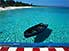 Painted wharf and turquoise sea at Maria La Gorda, western Cuba