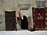 Carpets hang outside entrance to Madrasa Mosque, Old Town, Baku