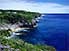 Surrounded by limestone cliffs and deep blue Pacific Sea