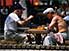 Men playing chess, each poised to pounce, Shevchenko Park, Odesa