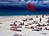 Sunbathers and soon-to-be airborne parasailer, Beachcomber Island