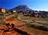 Farmers working in red mud, at village in highlands south of Antananarivo