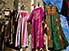 Multi-coloured clothing out to air in the market