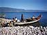 Taxi boat and passengers on shore of Lake Tanganyika, in northern Zambia