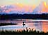 Lone boatman at sunset on Sepik River, near village of Maliwai, in Upper Sepik