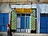 Man admiring paint, Tozeur, south western Tunisia