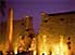 Imposing entrance to the Luxor Temple lit at night