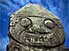 Monumental monster: carved stone face on one of the many statues at San Agustín