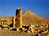 Ruins of ancient city of  Palmyra, with Arab Fort, built 1680, in background