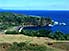 Blue waters and black sand beach at Sulphur Bay, Tanna Island